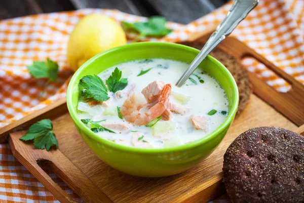 Sopa de crema de salmón Fotos de stock