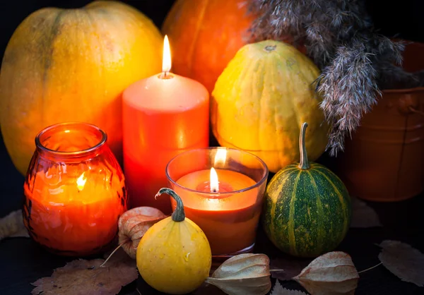 Pumpkins and candles — Stock Photo, Image