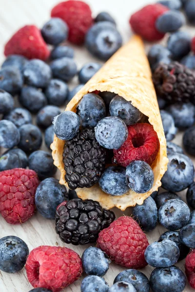 Fresh berries in waffle cone — Stock Photo, Image