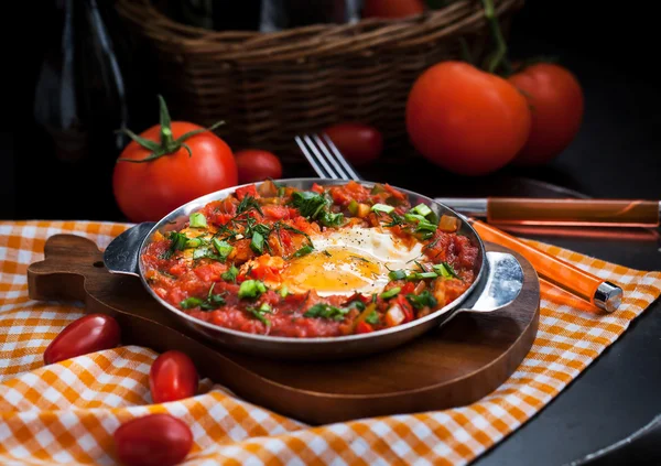 Shakshuka s rajčaty a vejci Stock Fotografie