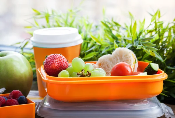 Lunch box with sandwich, cookies, veggies and fruits — Stock Photo, Image