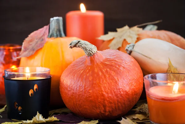 Halloween pumpkins and candles — Stock Photo, Image