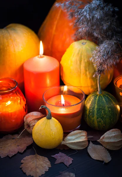 Pumpkins and candles — Stock Photo, Image