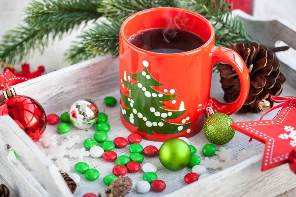 Christmas coffee cup and candies — Stock Photo, Image