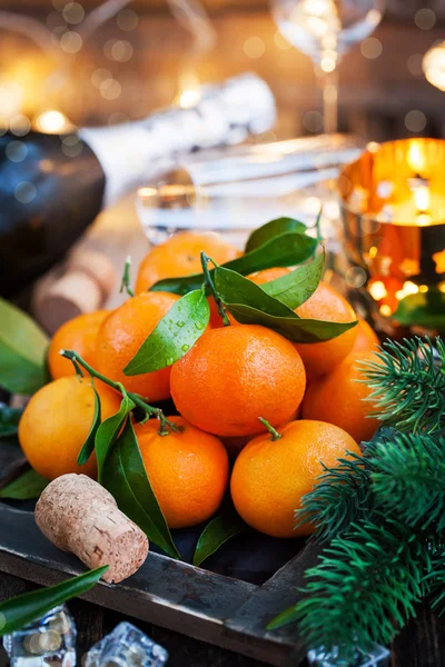 Fresh tangerines on holiday background — Stock Photo, Image