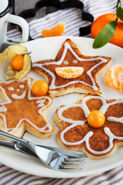 Funny children\'s pancakes for breakfast
