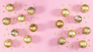 Altın Noel süslemeleri pembe temalı. Hareketi durdur 