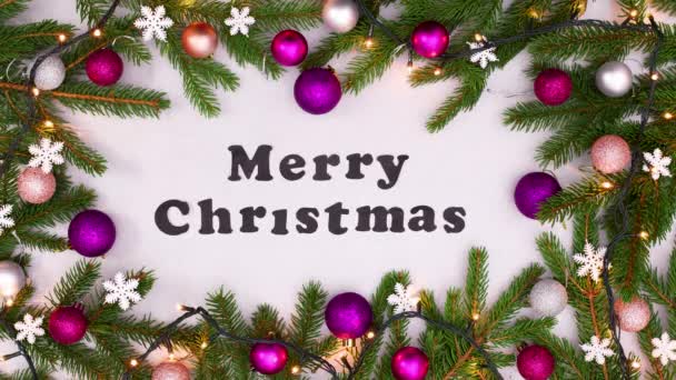 Blinking Lights Merry Christmas Text Christmas Frame Fenyőággal Rózsaszín Díszítéssel — Stock videók