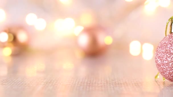 Decorazione Natalizia Rosa Pastello Glitter Sul Tavolo Con Luci Lampeggianti — Video Stock