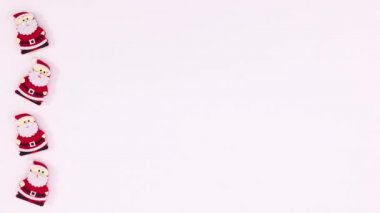 Noel Baba Clouse beyaz temanın sol tarafına geçiyor. Hareketi durdur