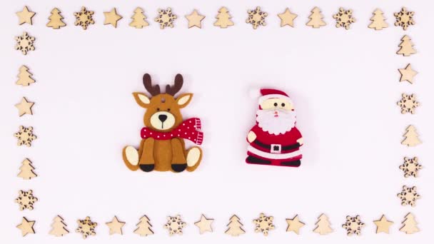 Санта Клаус Олени Перемещаются Внутри Рамы Деревянных Рождественских Украшений Стоп — стоковое видео