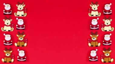 Noel geyikleri ve Santa Clouse kırmızı temanın sol ve sağ tarafında görünür. Hareketi durdur