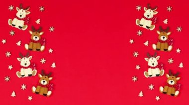 Noel geyikleri ve ahşap süsler kırmızı temanın sol ve sağ tarafında hareket eder. Hareketi durdur