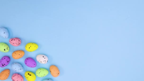 Moving Easter Eggs Left Corner Pastel Blue Theme Stop Motion — Stock Video
