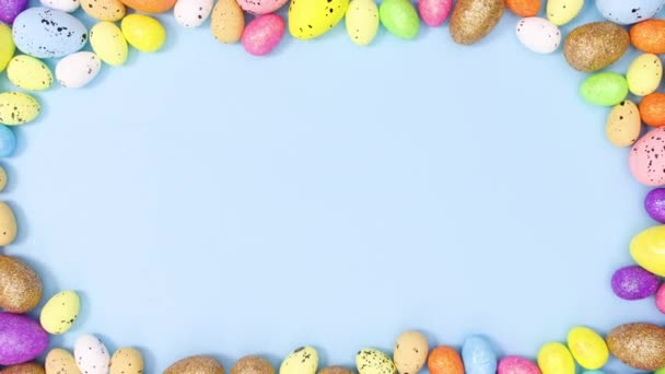 Colorful Easter Eggs Make Copy Space Frame Pastel Blue Background — Stock Video