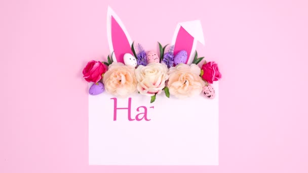 Happy Easter Tekst Schrijven Papier Met Bloei Arrangement Konijnenoren Stop — Stockvideo