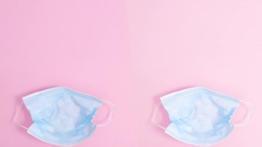 Yumurta ve tavşan kulaklı iki yaratıcı Paskalya maskesi. Hareketi durdur