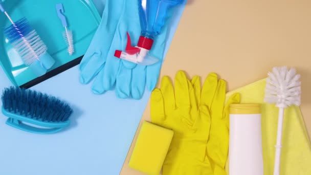 Blue Yellow Household Cleaning Sanitary Tools Move Beige Blue Background — Stock Video