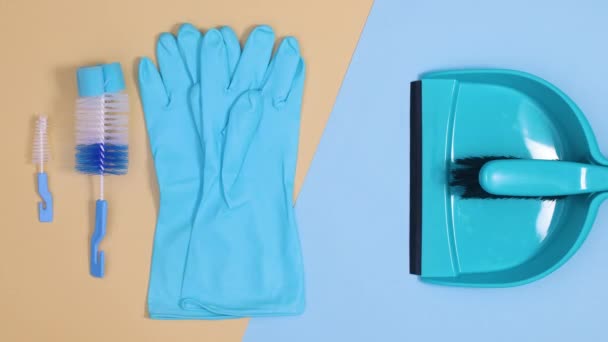 Blue Gloves Cleaning Brushes Household Tools Blink Blue Beige Background — Stock Video