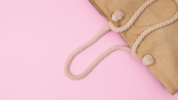 Trendy Accessories Beach Summer Appear Pastel Pink Background Stop Motion — Stock Video