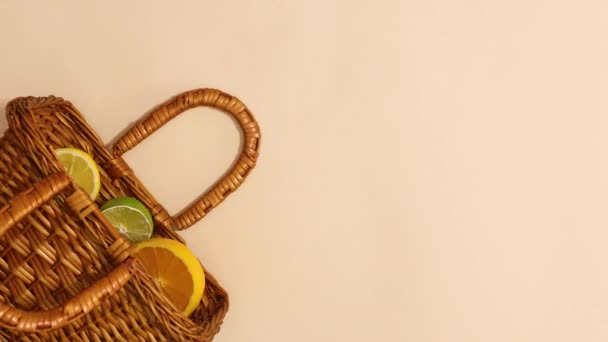 Citrus Fruits Appear Wooden Basket Beige Background Stop Motion — Video