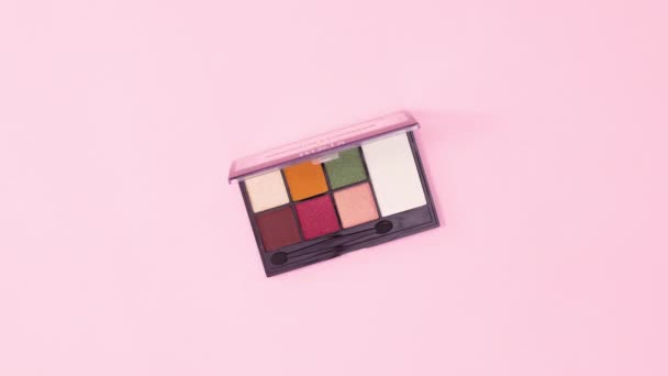 Eye Shadow Palette Rotating Pastel Pink Background Stop Motion Flat — Stock Video