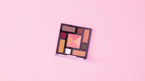 Eye Shadow Palette Rotating Pastel Pink Background Stop Motion Flat — Stock Video