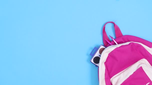 School Stationery Appear Backpack Blue Background Stop Motion — Stock Video