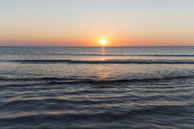 okyanus manzara arka planları için gün batımı ile