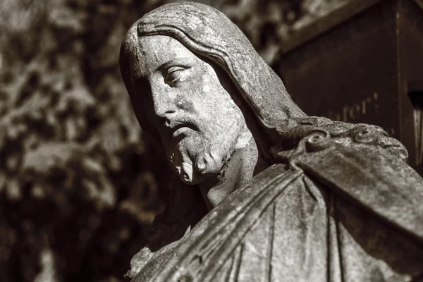Black and white shot of a jesus sculpture — Stock Photo, Image