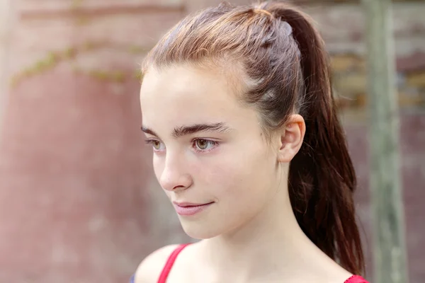 Portrait in profile of a beautiful teenage girl — Stock Photo, Image