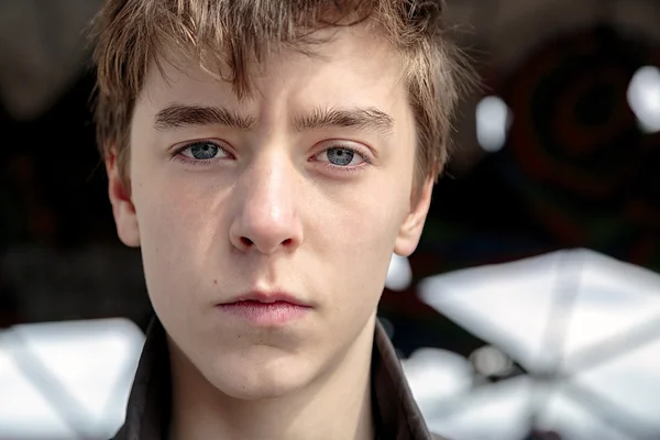 Close up portrait of a serious teenage boy — Stock Photo, Image