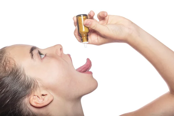 kadın dili, isol ucunda bir homeopatik globüller