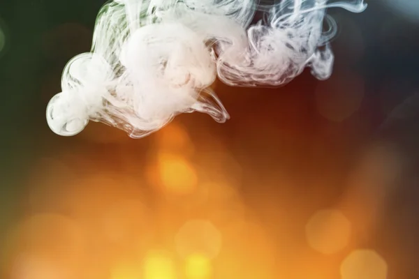 Roken met gekleurde lampen voor composities en overlays — Stockfoto