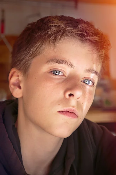 Portrait of a teenage boy with light leak — Stock Photo, Image