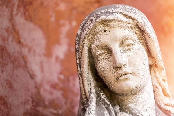 Portrait of a weathered maria sculpture — Stock Photo, Image