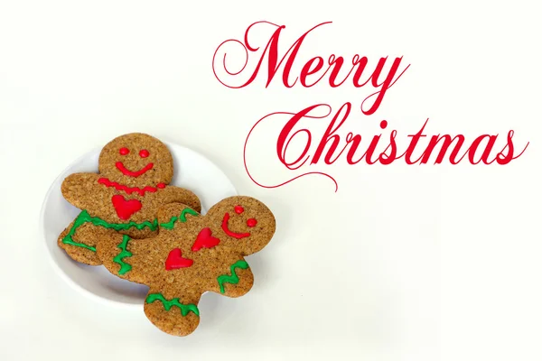 Christmas Gingerbread Man and Woman on Plate Isolated with Text — Stock Photo, Image