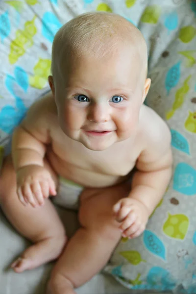 Chubby Baby Sitting in House Smiling — Zdjęcie stockowe