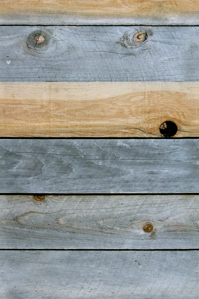 Фону деревини текстурованих погодних дощок — стокове фото