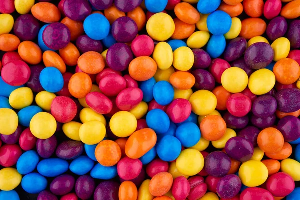 Fondo de coloridos ingredientes de caramelo y chocolate — Foto de Stock