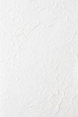 Dokulu beyaz el işi kağıdının yakın plan resmi