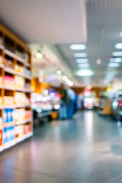 Grocery store. Shelves and glass cases with different foods