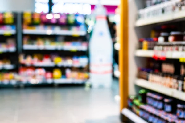 Grocery store. Shelves and glass cases with different foods