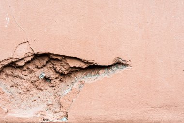 Harap olmuş pembe duvar. Görüntüyü kapat