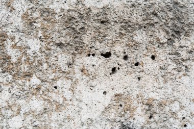 Delikli eski taş duvar. Görüntüyü kapat