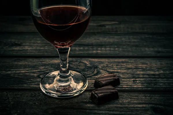 Glass Red Wine Chocolate Old Wooden Table — Stock Photo, Image