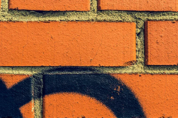 Graffiti Röd Tegelvägg Närbild — Stockfoto