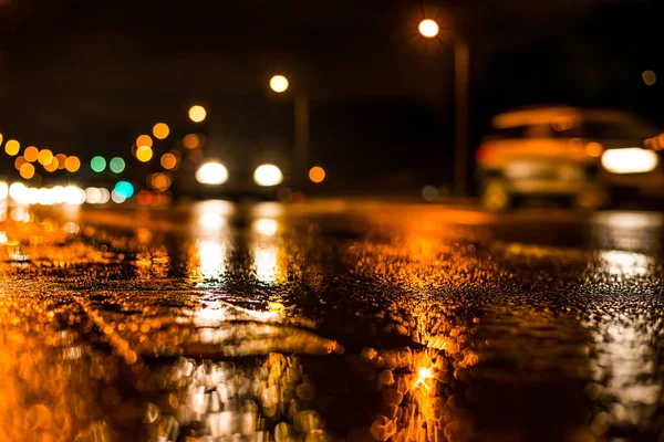 Rainy night in the big city, highway passing through a forest