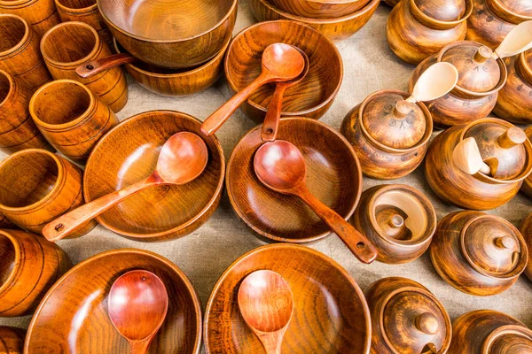 Different wooden utensils on the storefront window