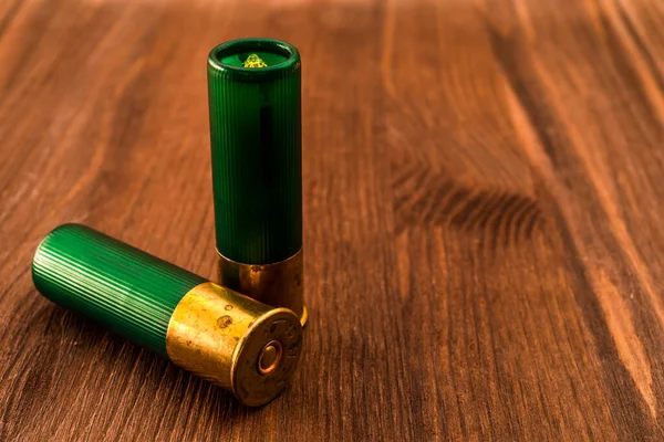 Two Gauge Bullets Lying Wooden Table — 图库照片